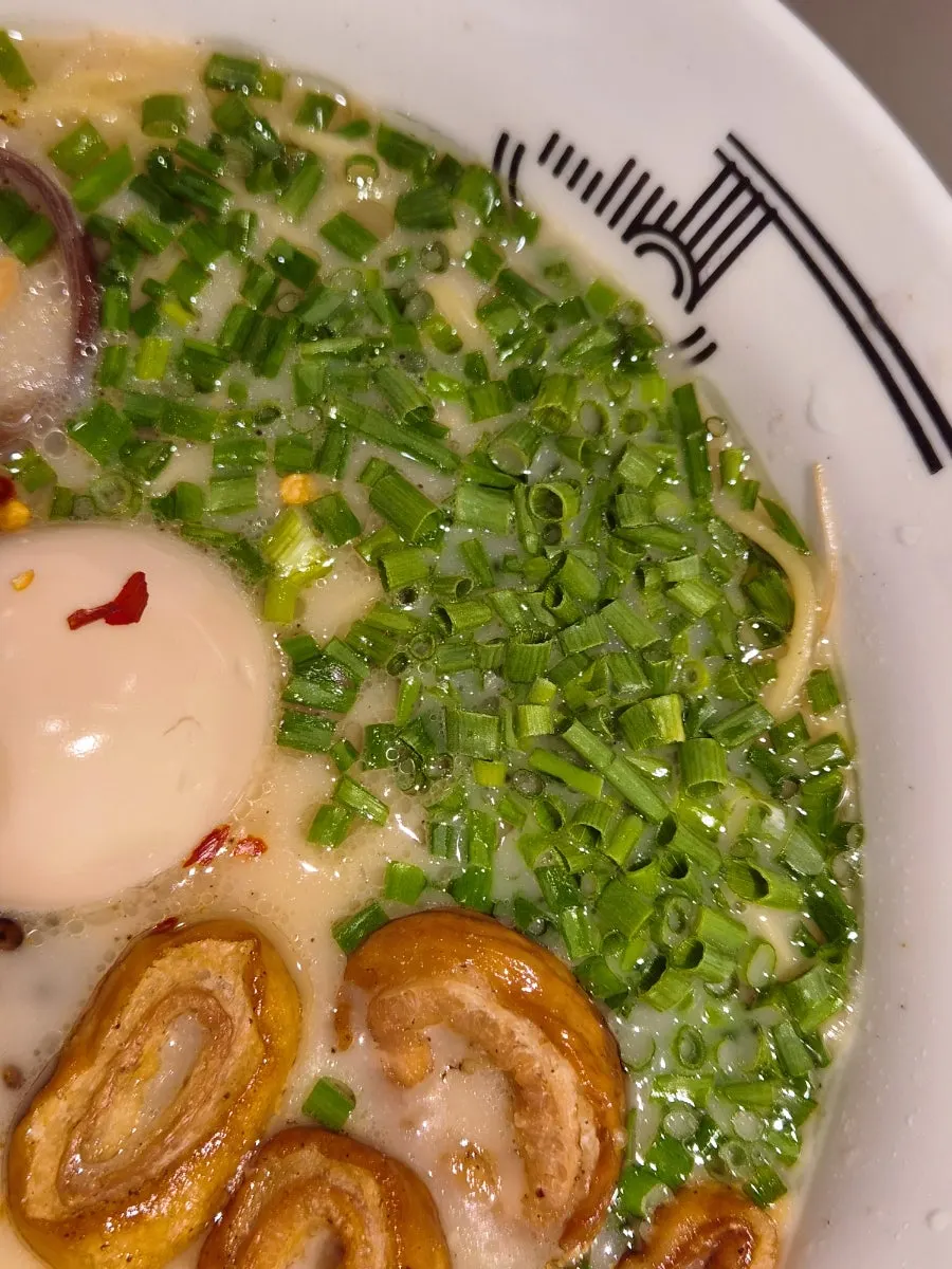 Fried intestines paired with the broth in Motsu Ramen
