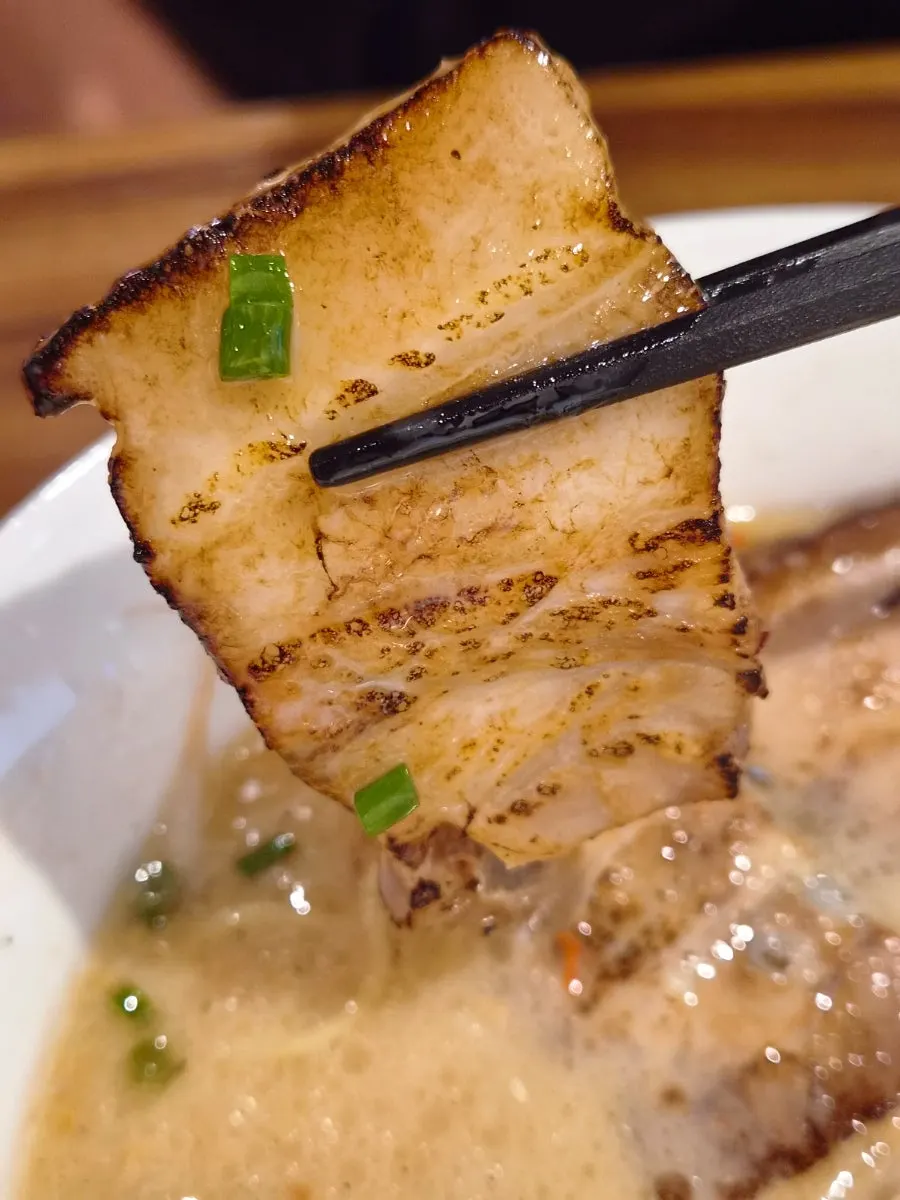 The ramen broth as it first arrives, unmixed