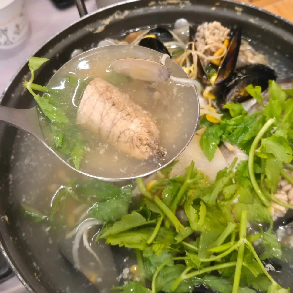 A spoonful of dongtae tang broth