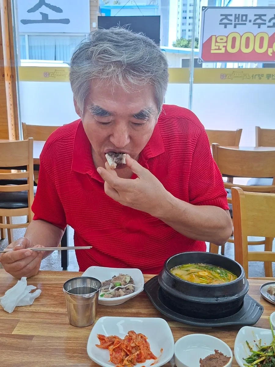 Taking a bite of beef tail