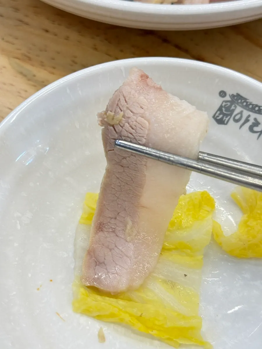 Bossam served over a warm stone plate