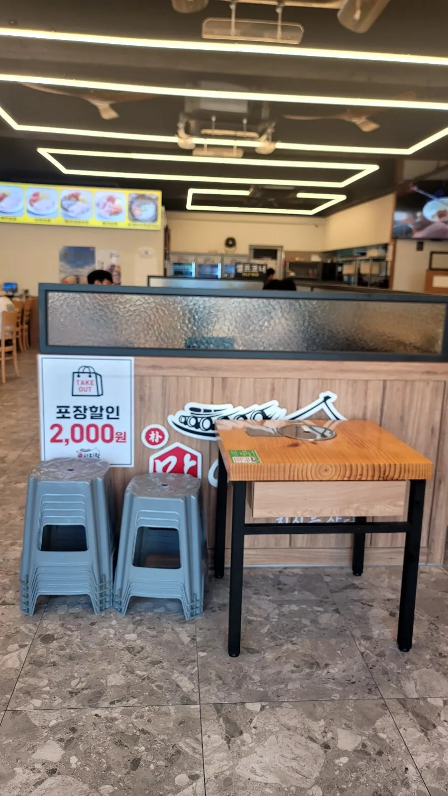 Table with a sanitized utensil holder