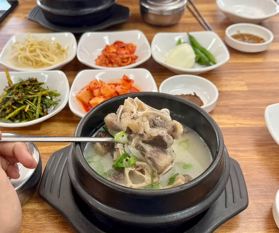 A bowl of beef tail soup on the table