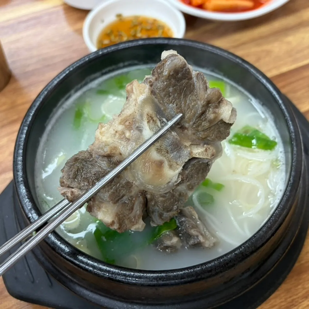 Signature photo of Hanwoo beef tail soup at Mujinjang Sik-yuk Kkori Gomtang