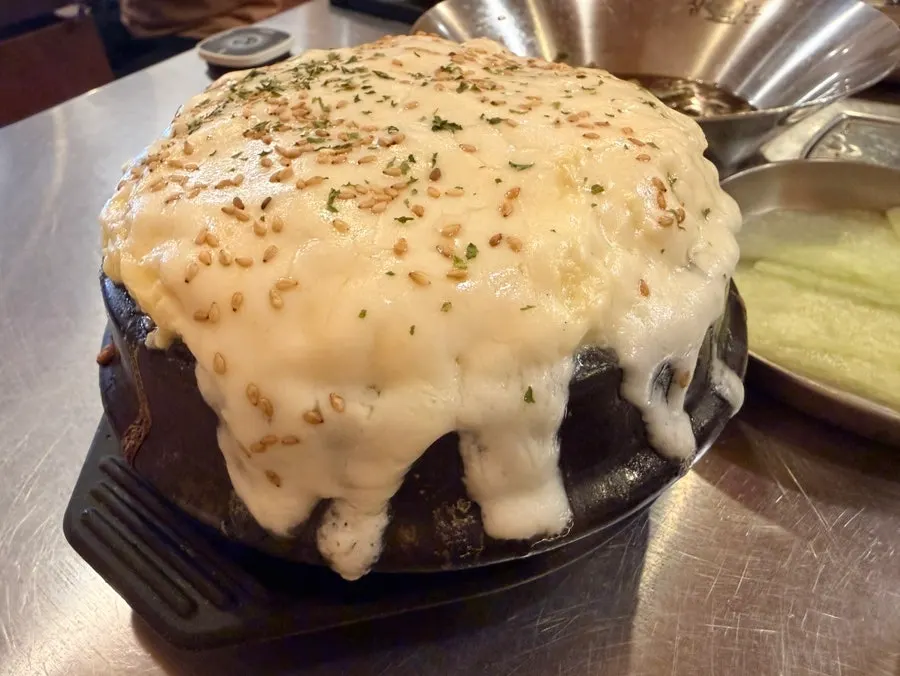 Steamed egg piled high with cheese