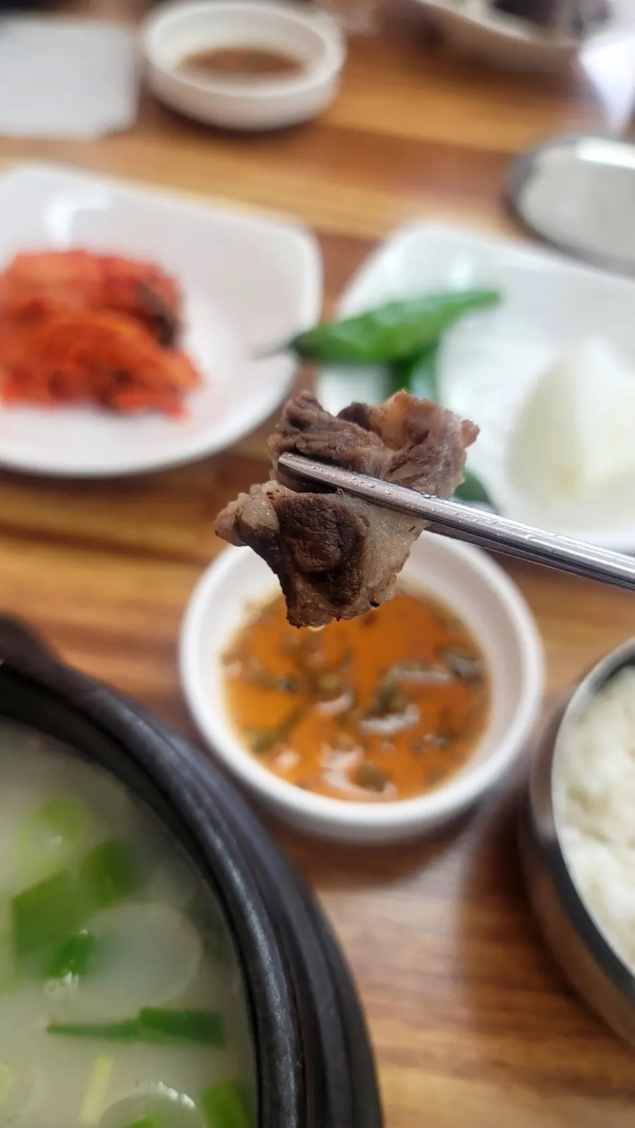Tail meat separating from the bone