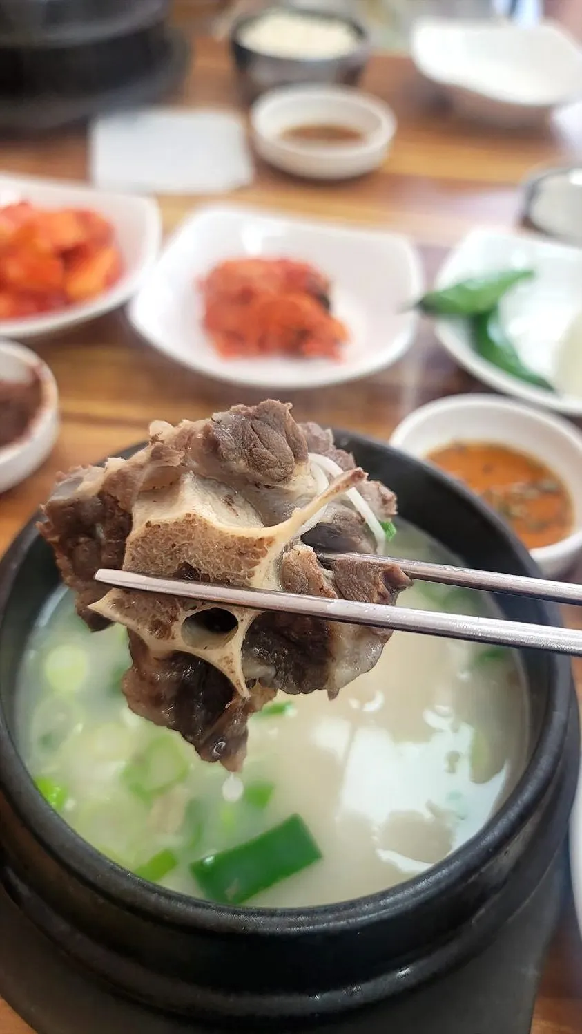 Rice mixed into rich broth