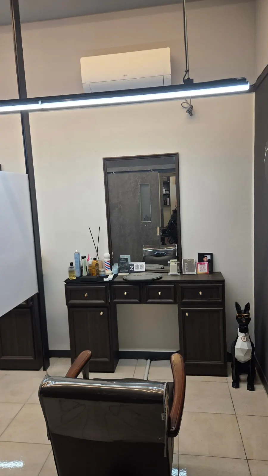 Salon interior with neatly arranged styling chairs