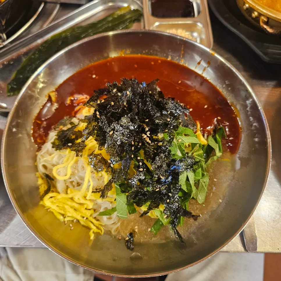 Bibim milmyeon evenly tossed in sauce