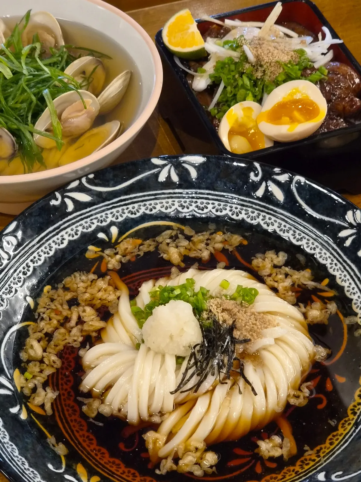 Clam udon, bukkake, grilled short rib bowl, and shrimp mayo all served together