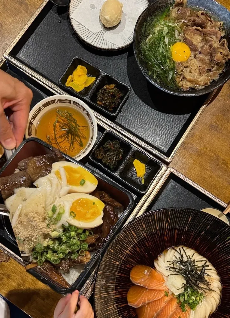 Table set with udon and rice bowl dishes