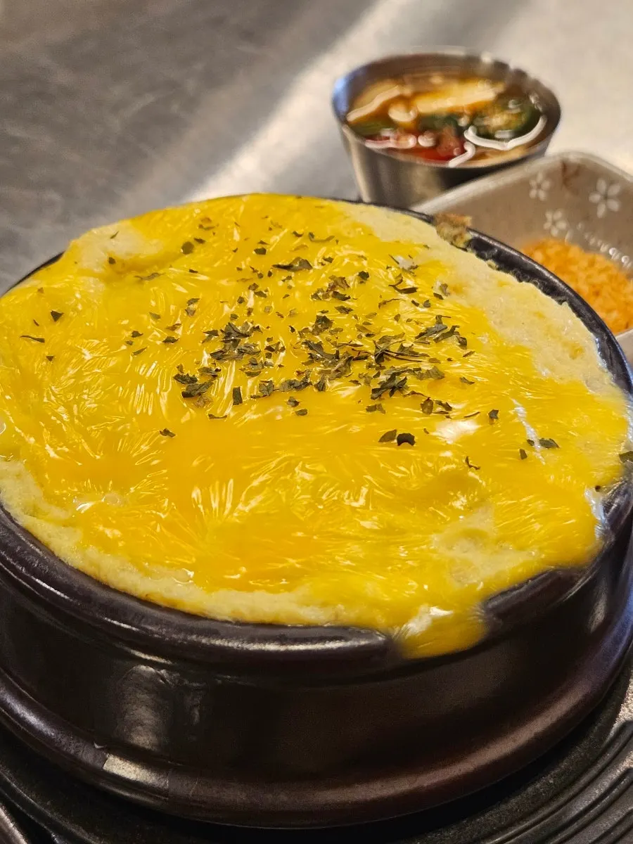 Complimentary cheese egg soufflé at Moksam Hwaro