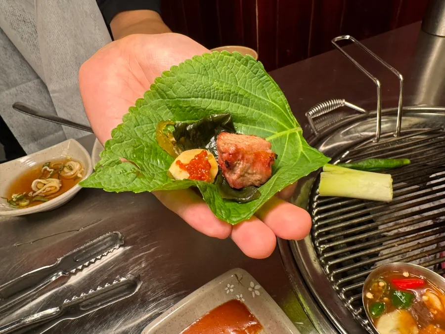 Grilled pork neck sliced into bite-sized pieces