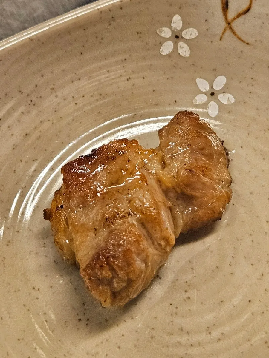 Pork neck cut into bite-sized pieces