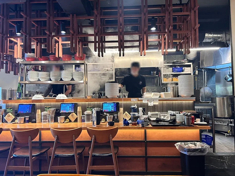 View of customers seated in the ramen restaurant's dining hall