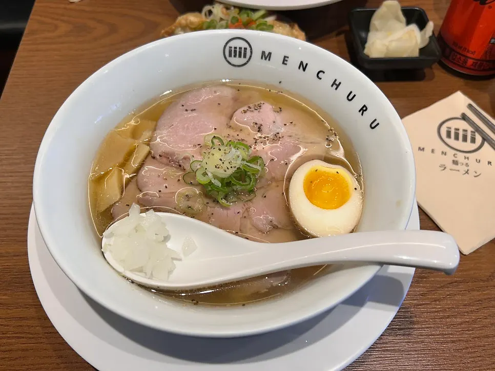 Shio ramen topped with menma and soft-boiled egg