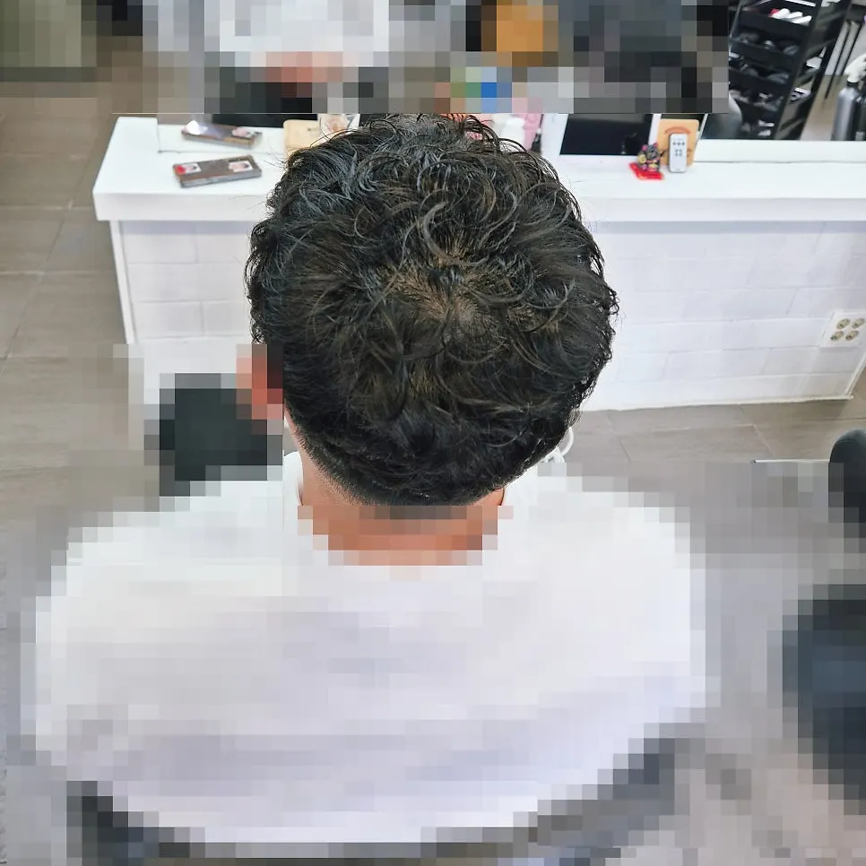 Back view of hair trimmed neatly down to the nape