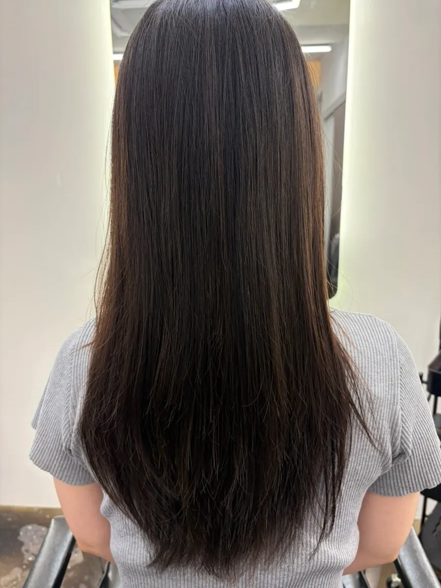 Glossy layered cut hair after treatment
