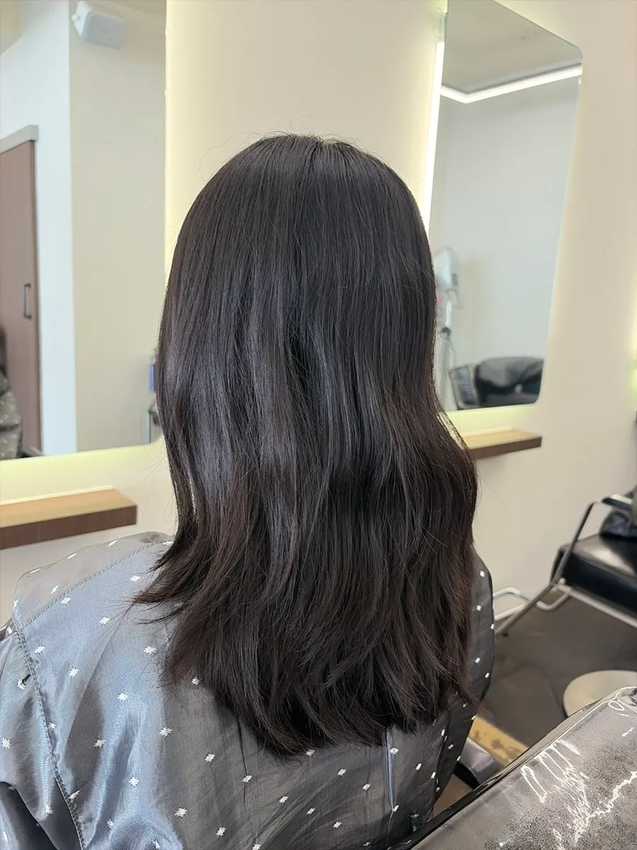Before shot of unstyled, unmanaged medium-length hair