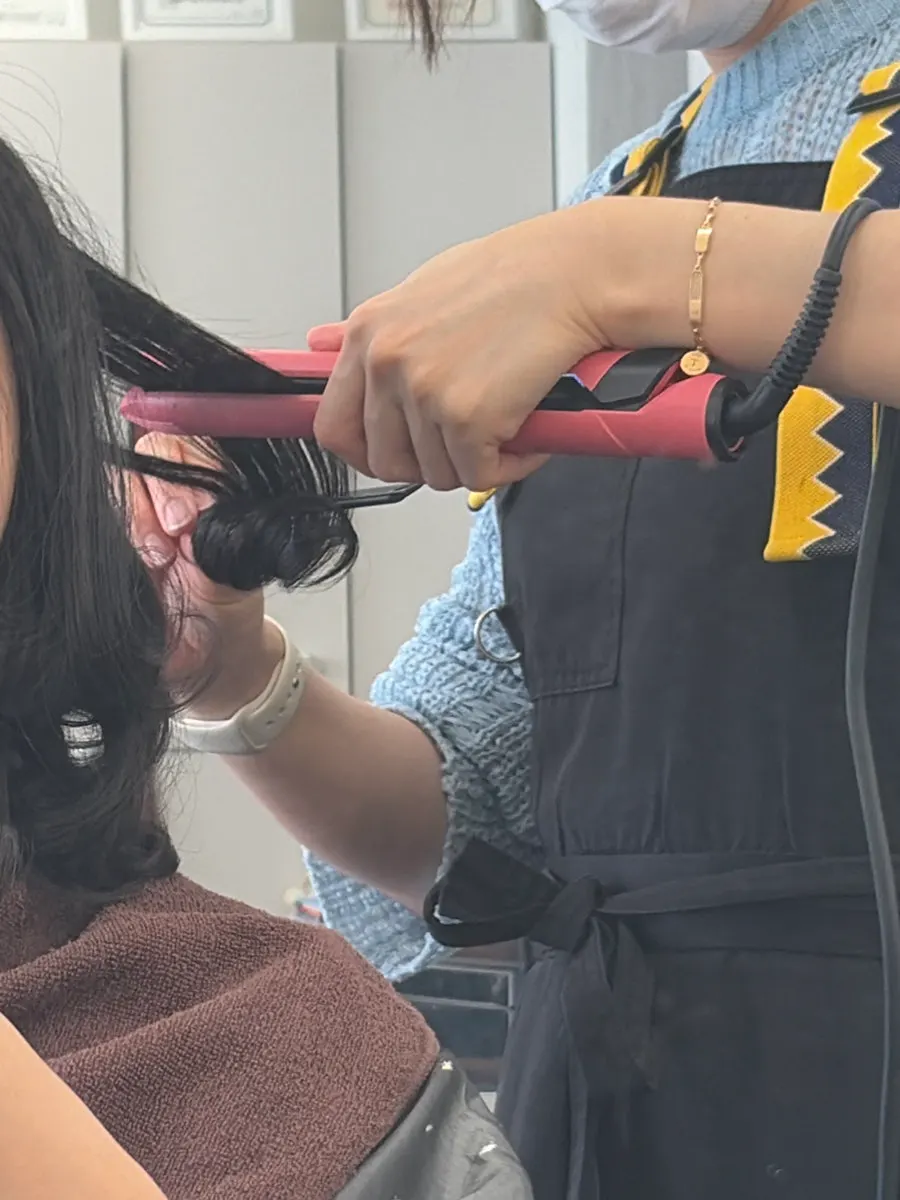 Styling underway for the natural C-curl look