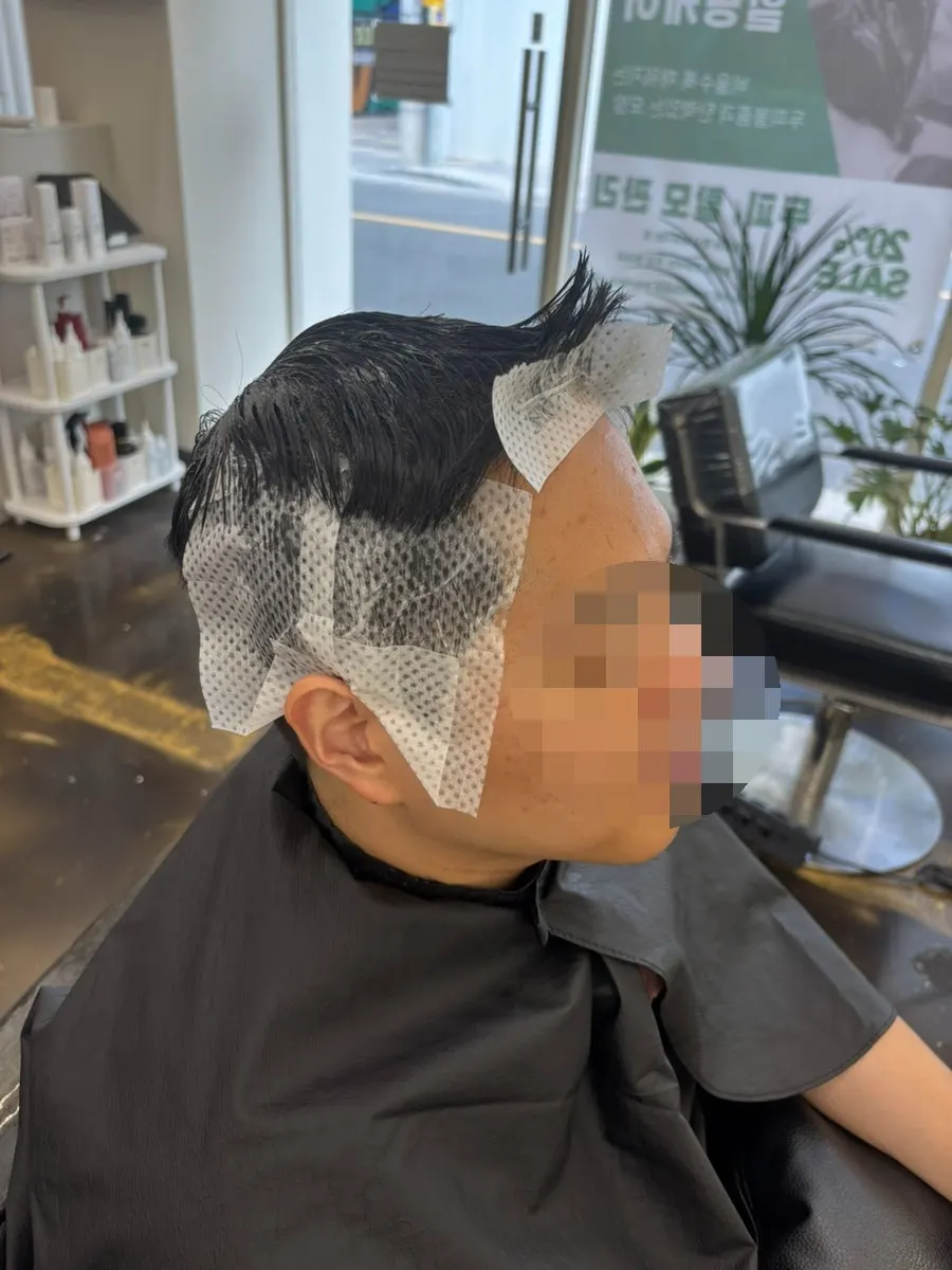 Finishing touches on the bangs right after the cut