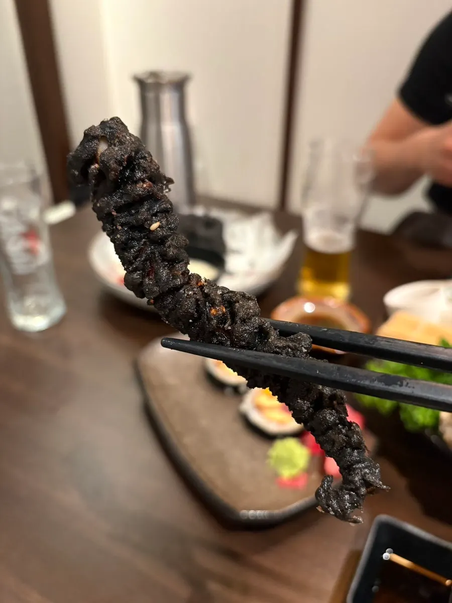 Crispy fried squid ink tempura