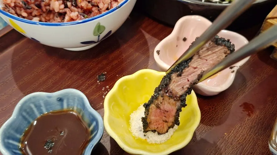 Black gyukatsu and yakitori-don served together