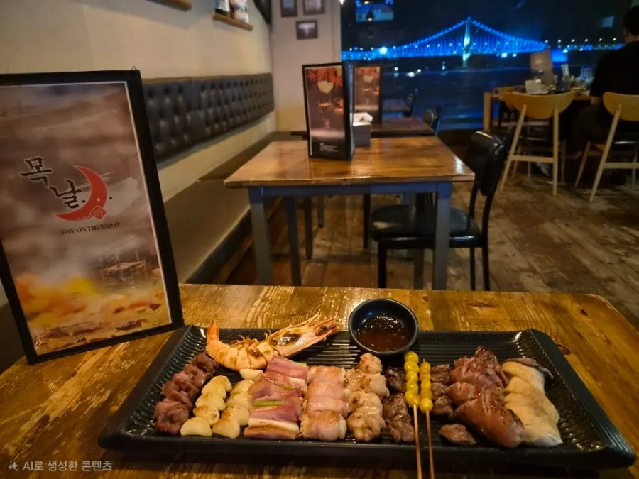 목날 좌석에서 보이는 광안대교 야경