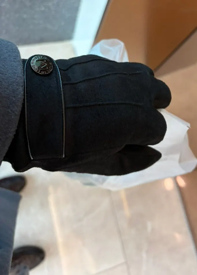 Black gloves worn while out