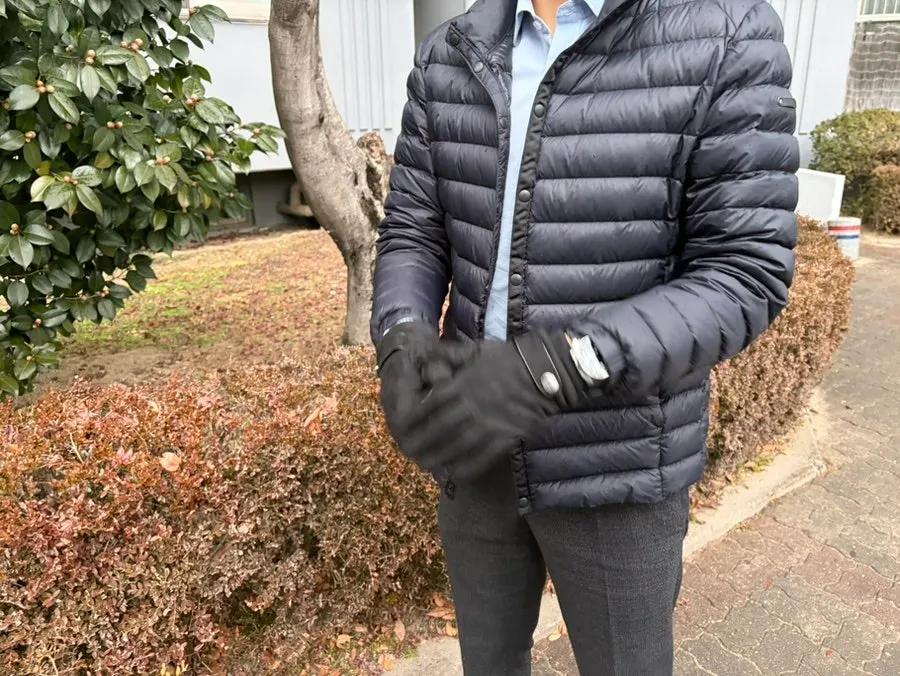 Suede gloves worn on hands