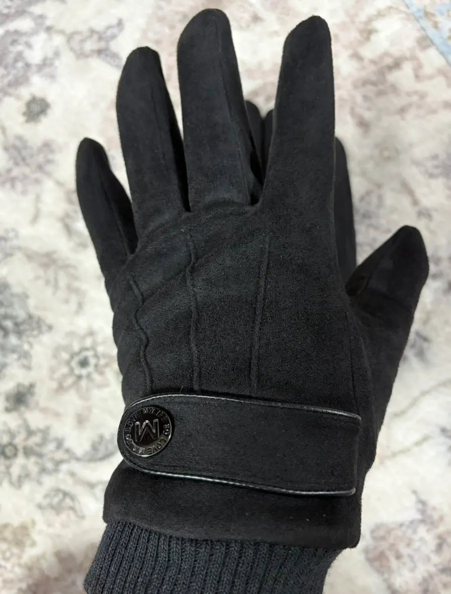 Black men's winter gloves being worn