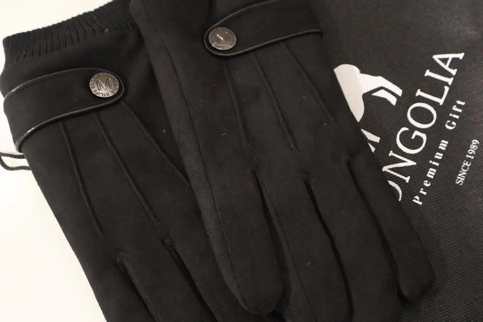 Detailed view of men's suede gloves