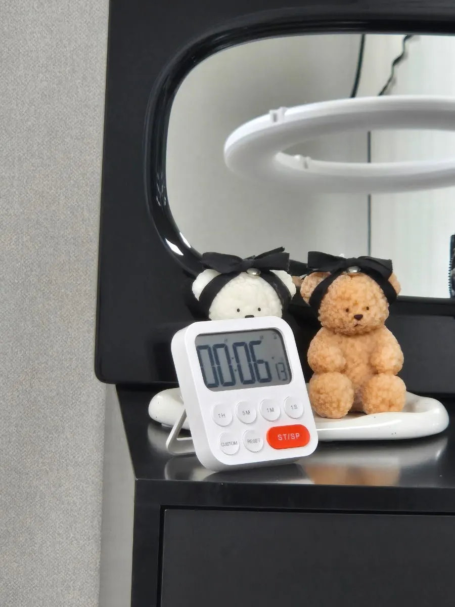 Timer used to track numbing cream application time