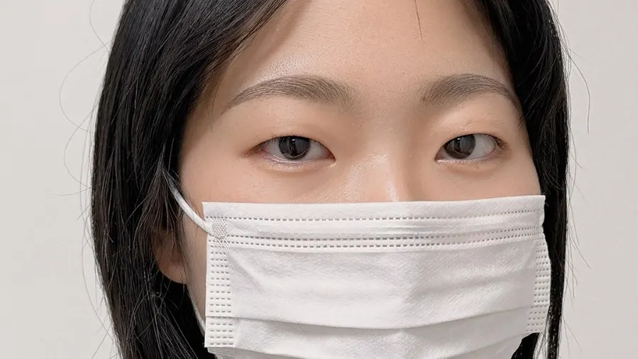 Face after the eyebrow tattoo procedure
