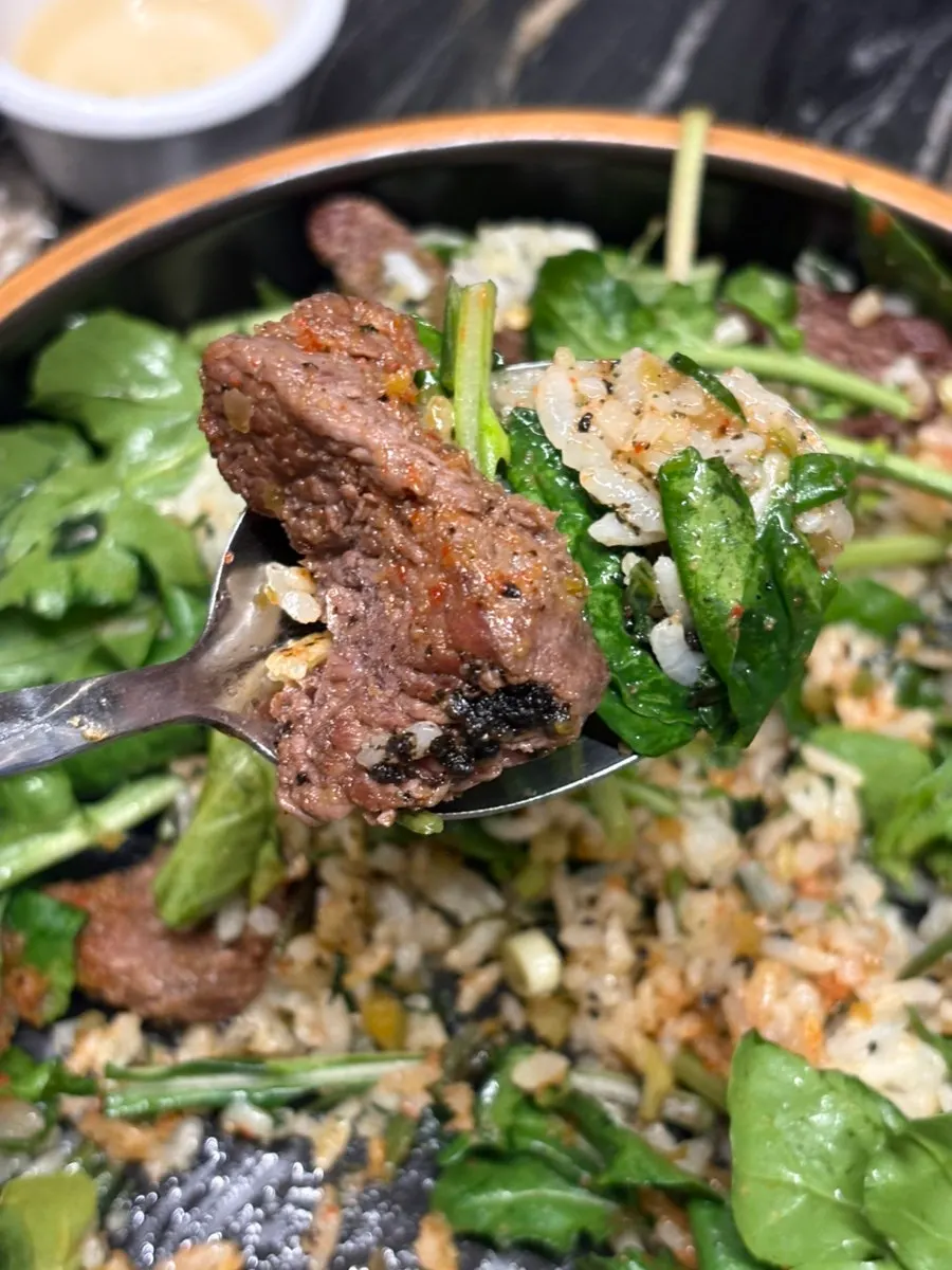 Bowl of steak bibimbap before mixing