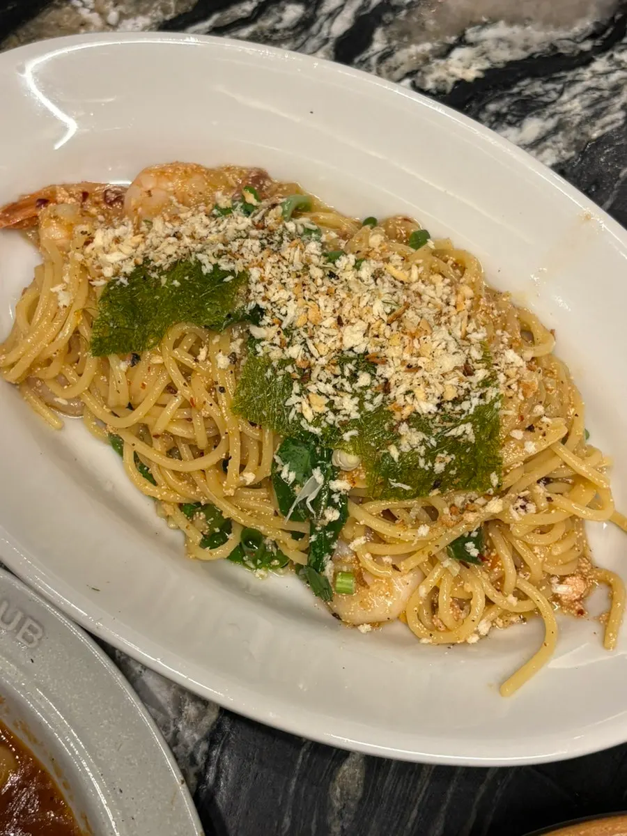 A plate of mentaiko shrimp oil pasta