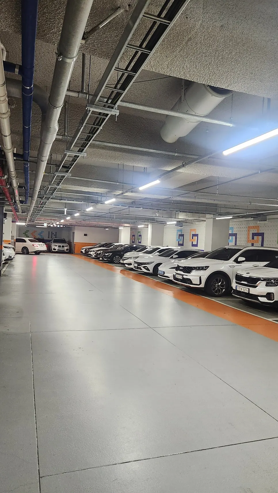 Spacious interior of Yastech Tower underground parking