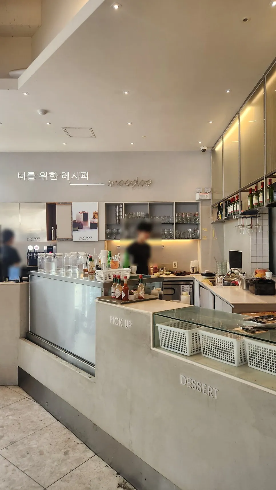 Open kitchen where the cooking process is visible