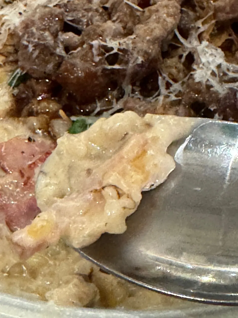A plate of steak galbi cream risotto