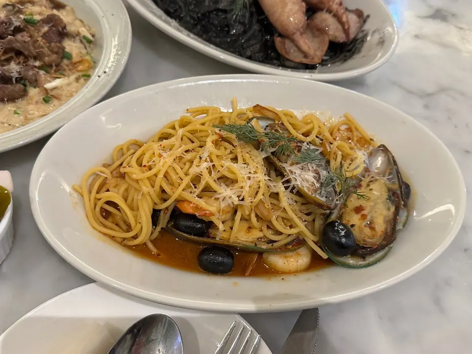 A bite of risotto with galbi steak