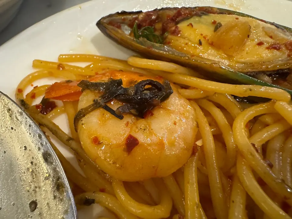 Seafood pasta with shrimp and olives