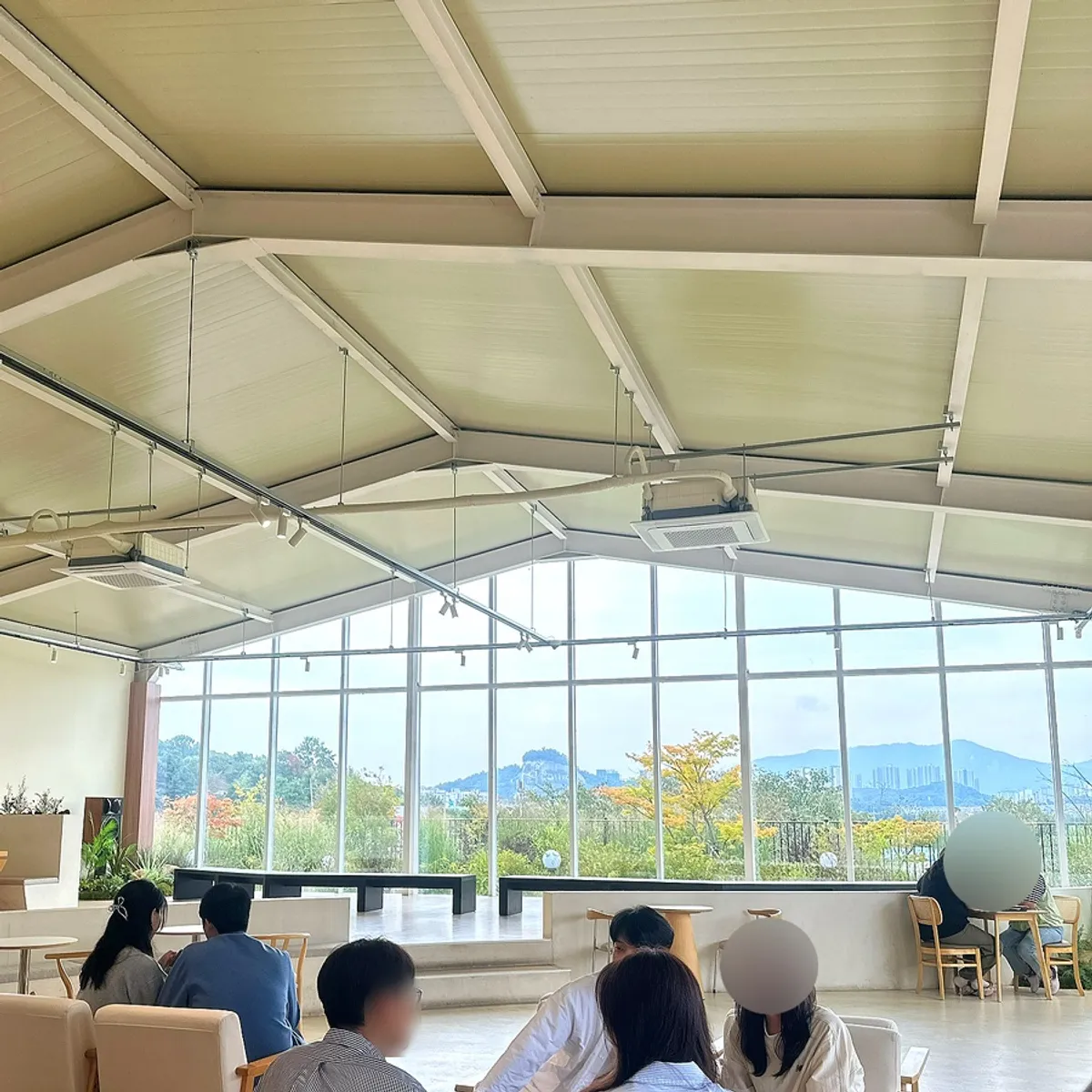 Indoor table and chair arrangement at Moonbird