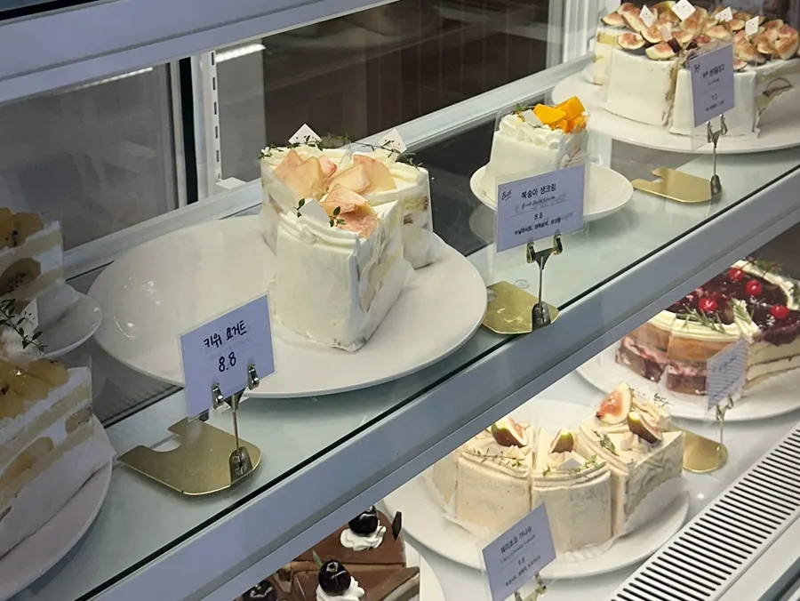 Assorted cake slices on display