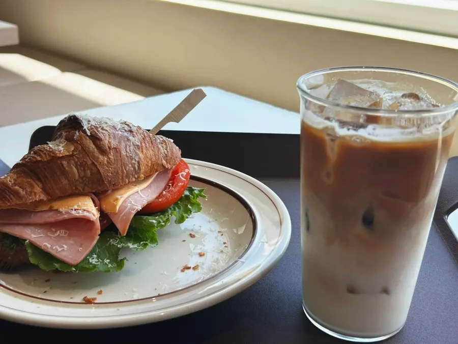 Green onion cream cheese croissant sandwich with latte