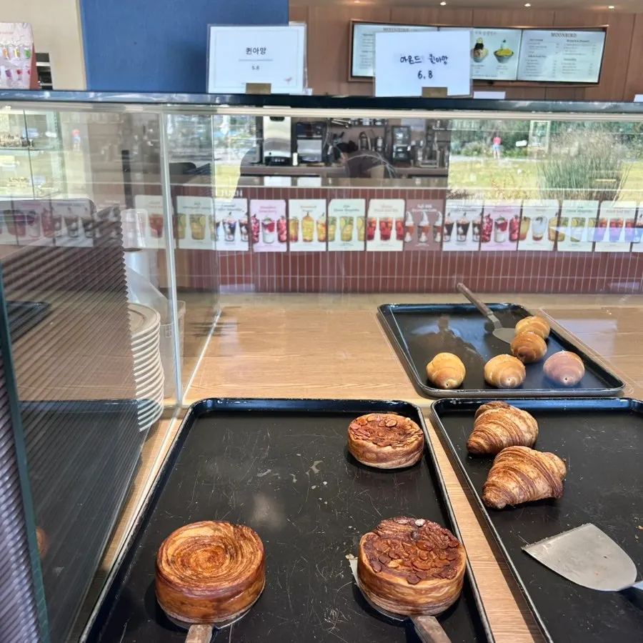 Kouign-amann and other bakery items on display at Moonbird