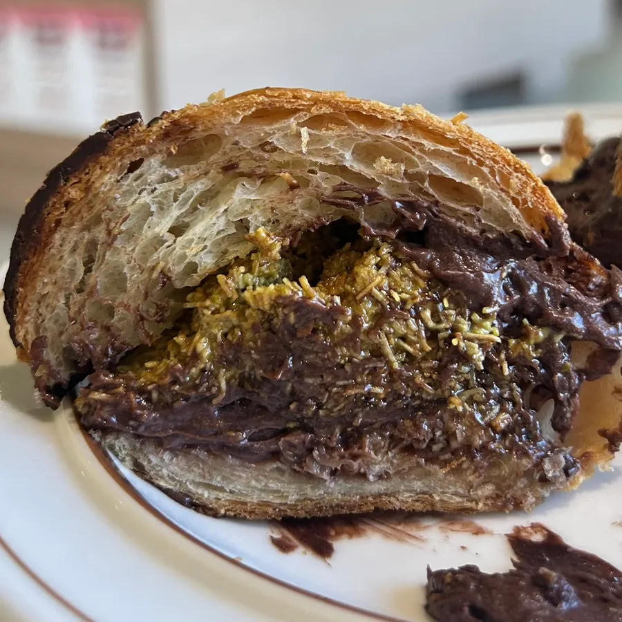 Cross-section of the Dubai croissant filled with pistachio and kadayif