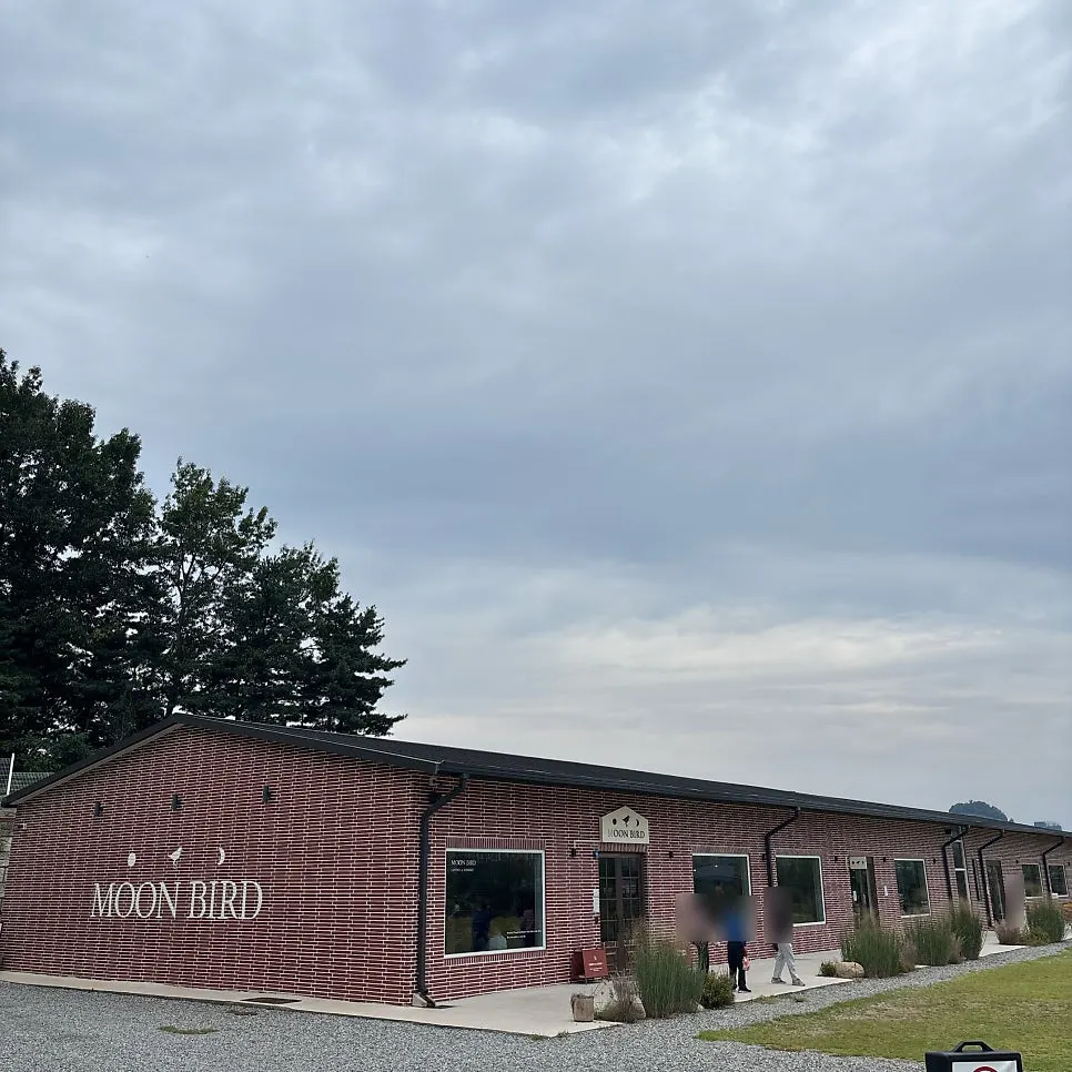 Red-brick exterior of Moonbird, a large café in Yangju
