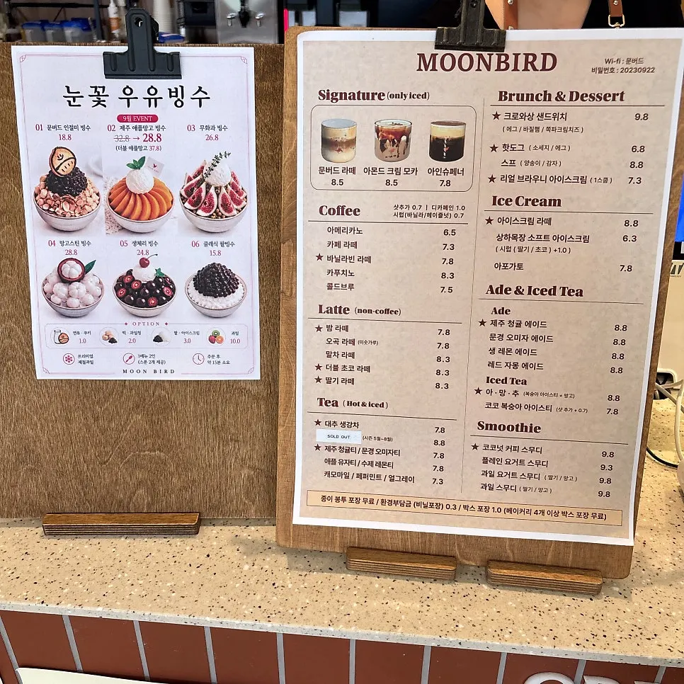 Moonbird's drink and snow-flake milk shaved ice menu board