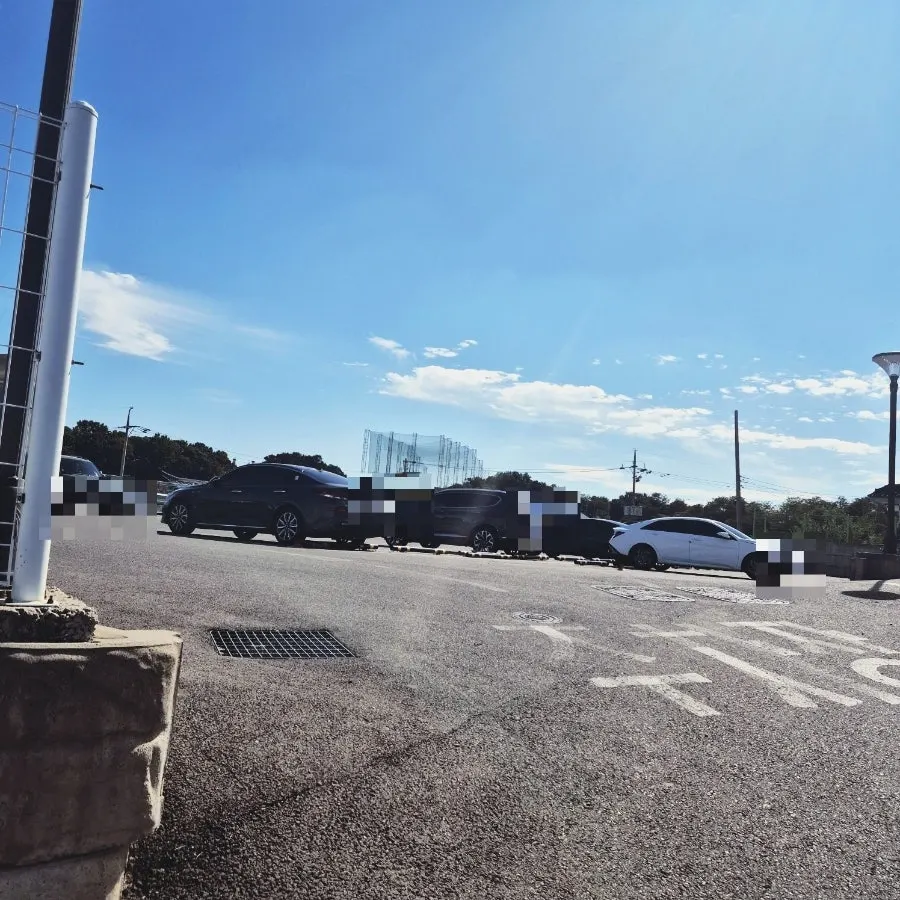 The approach road to Moonbird with a barrier gate
