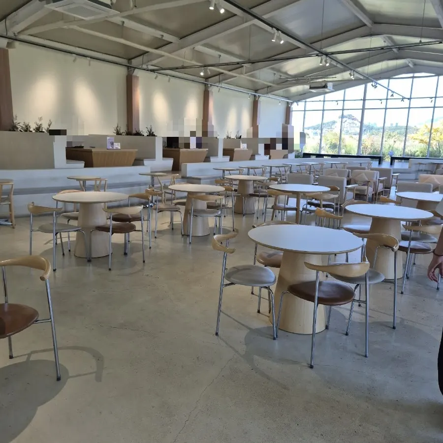 Wood-toned furniture in Moonbird's main hall